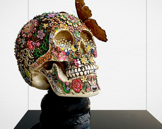 'Beauty in Death' decorated resin skull and butterfly by Glen Middleham