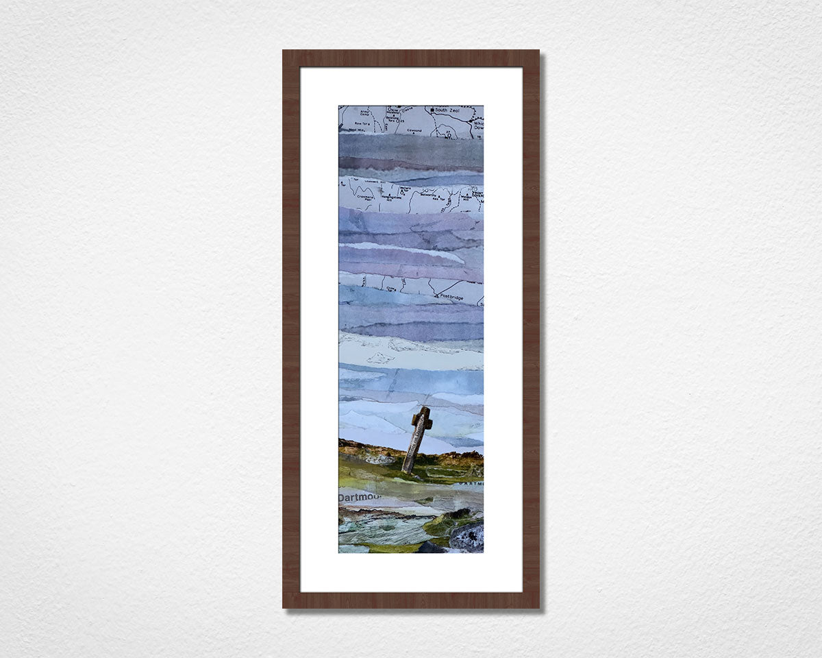 Framed landscape collage of Dartmoor National Park in Devon on a white wall.