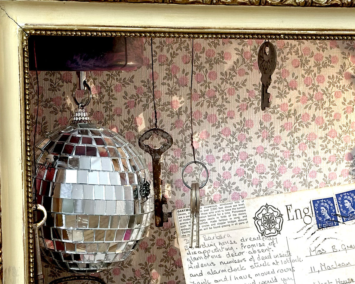 Detail of 'Wish You Were Here' vintage holiday suitcase diorama by Glen Middleham