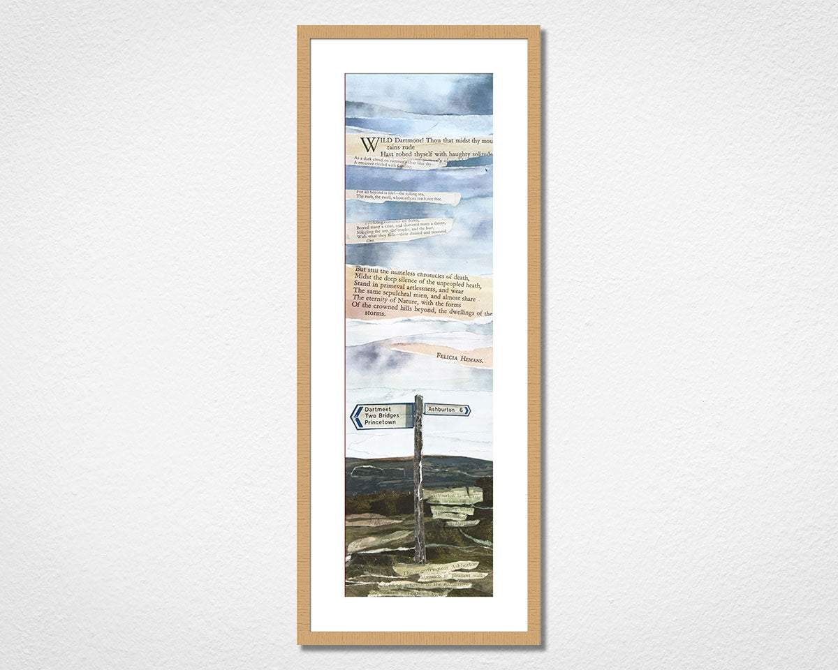 Original landscape art collage of Ashburton, a town close to Dartmoor National Park in Devon in a light oak frame on a white wall