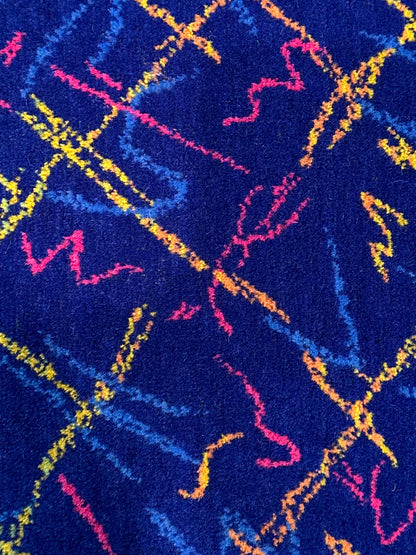 Detail of moquette cushion - Blue with neon squiggles