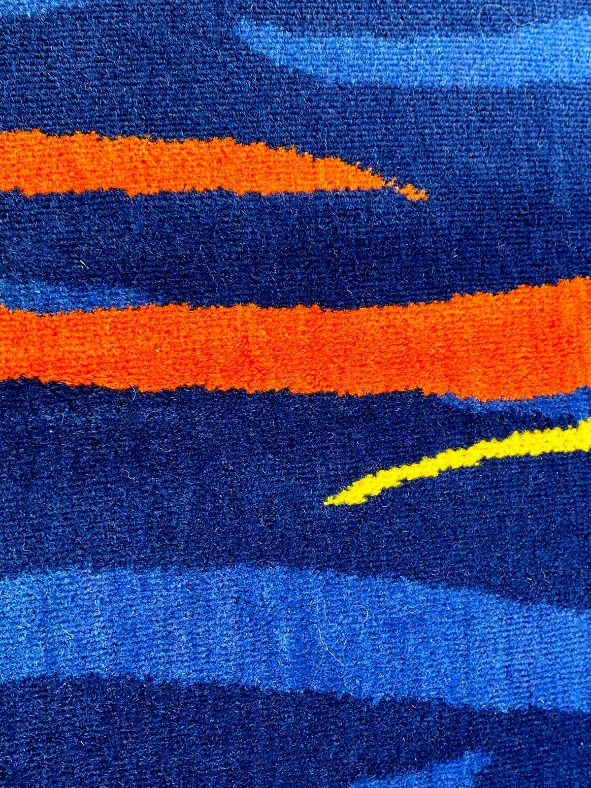 Blue with orange lines cushion from Jam