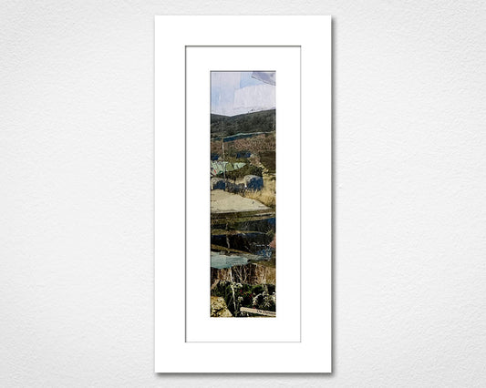 Framed landscape collage of Dartmoor National Park in Devon on a white wall.