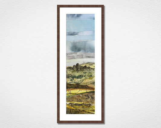 Original landscape collage inspired by Dartmoor National Park in Devon in a walnut frame on a white wall