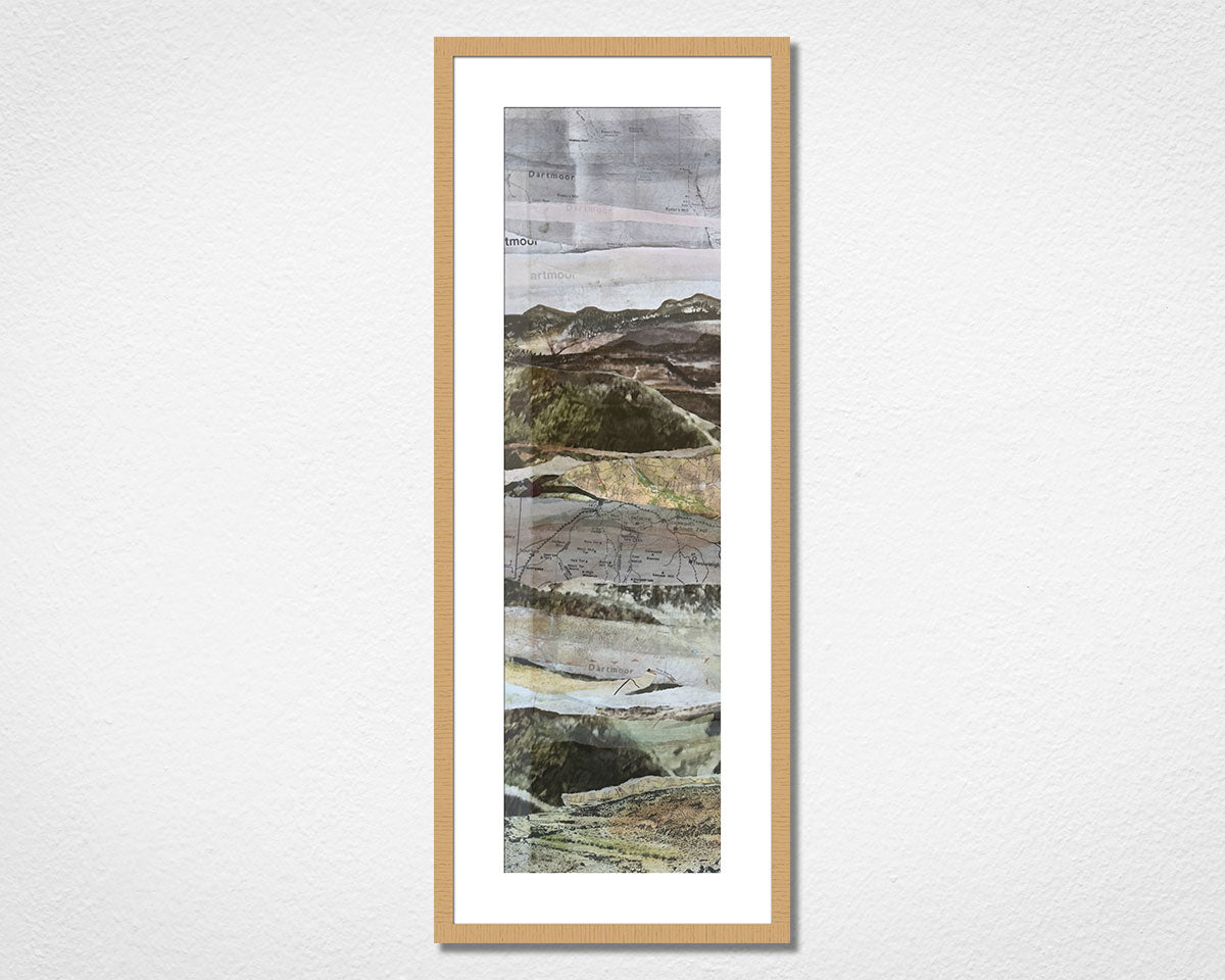 Original landscape collage inspired by Dartmoor National Park in Devon in a light oak frame on a white wall