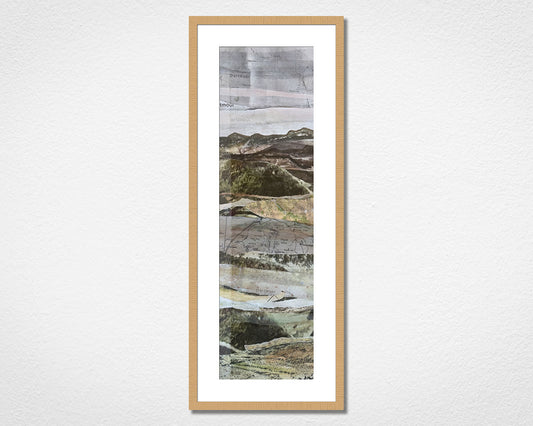Original landscape collage inspired by Dartmoor National Park in Devon in a light oak frame on a white wall