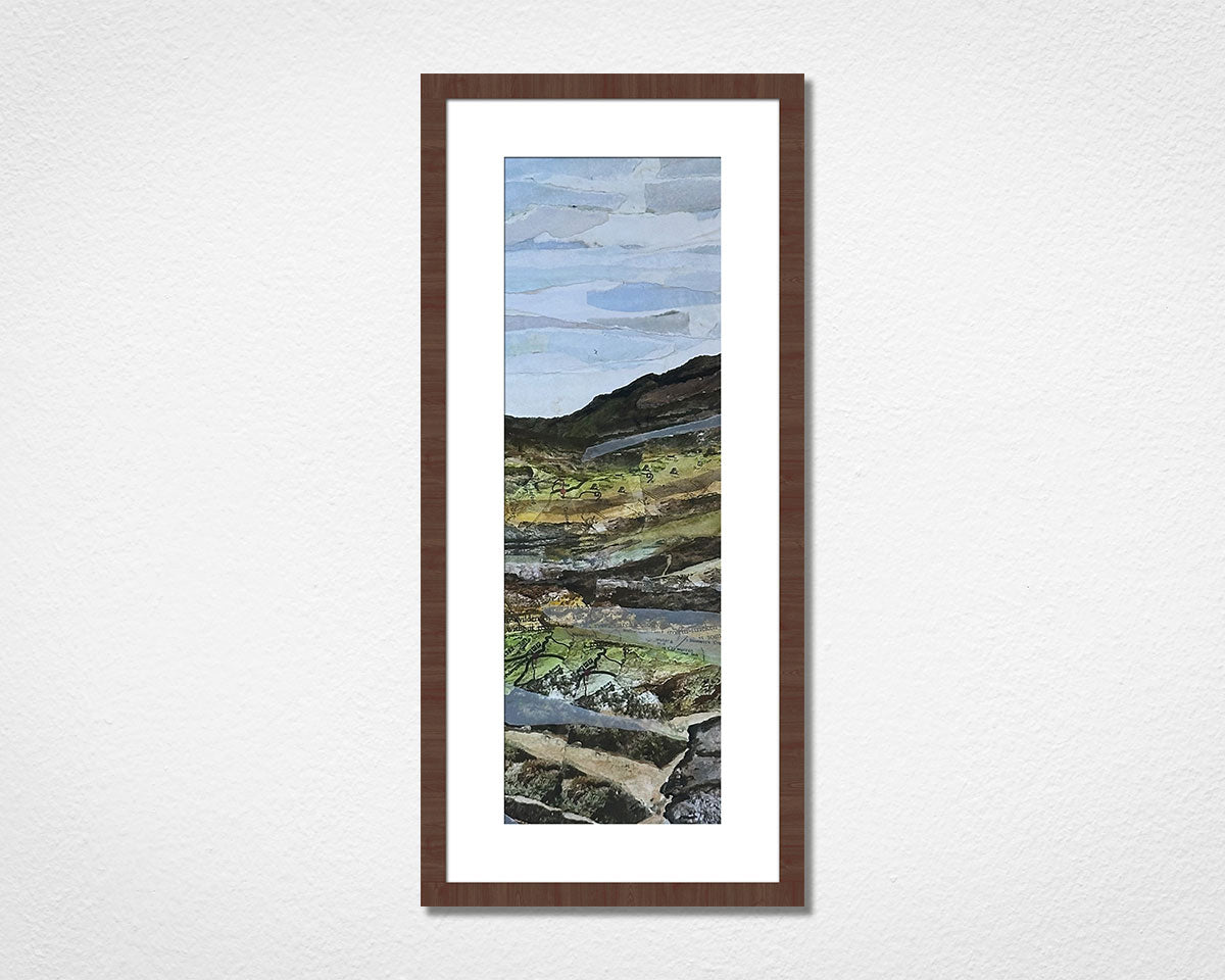 Framed landscape collage of Dartmoor National Park in Devon on a white wall. 