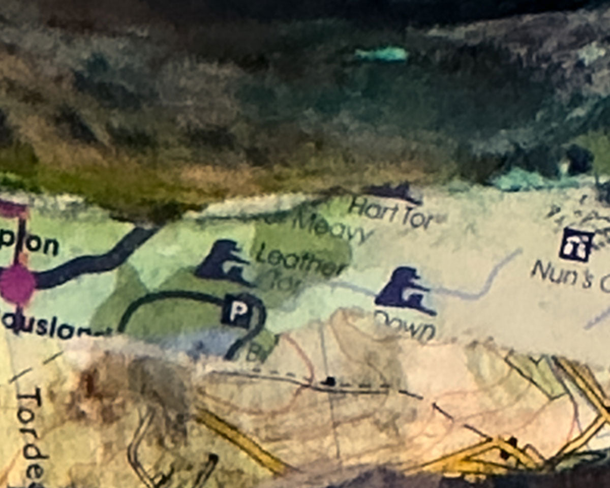 Detail of a Framed landscape print of a mountainous scene of Dartmoor National Park.