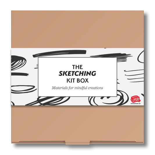 Sketching kit set with brown lid and white label featuring black text and abstract designs.