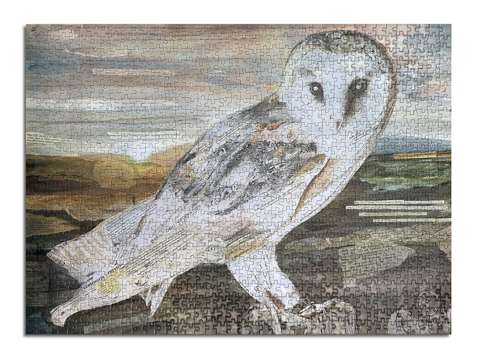 Completed jigsaw puzzle featuring a barn owl design produced by Jam Contemporary Art and the Barn Owl Trust