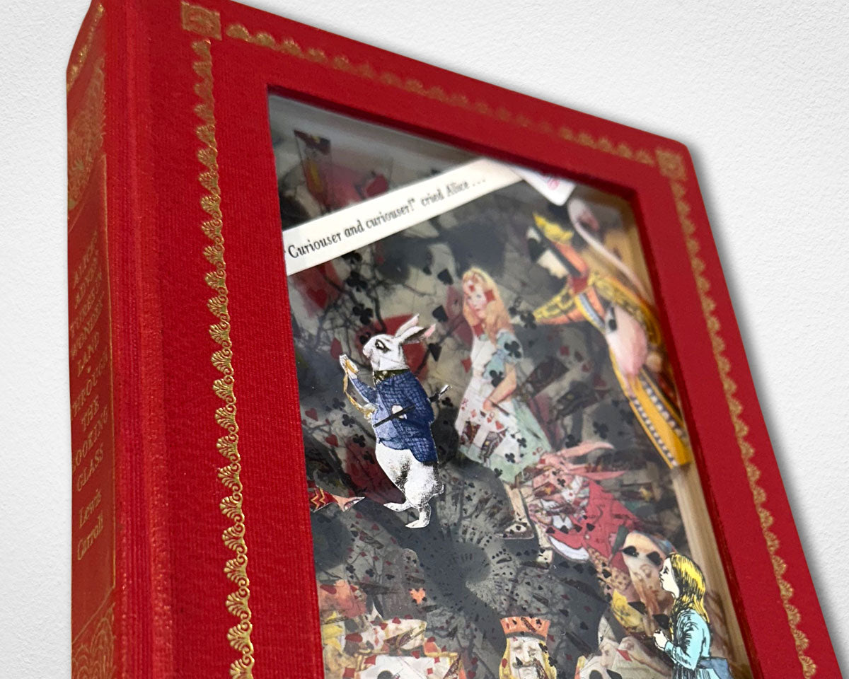 Detail of the Alice in Wonderland paper cut vintage book diorama